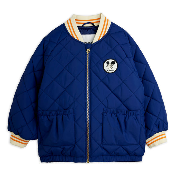 A navy blue quilted bomber jacket with a gold zipper, featuring a circular Mickey Mouse patch on the left chest, striped collar and cuffs, and front patch pockets, shown against a plain white background.