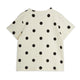 An off-white short-sleeve top with black polka dots, shown flat against a white background.