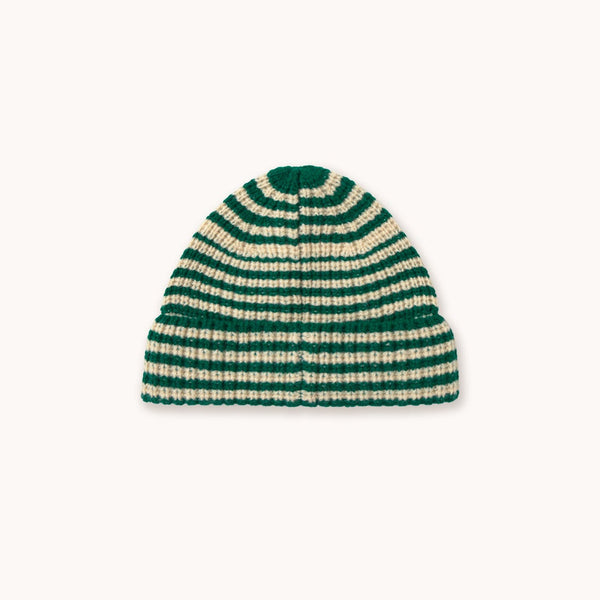 A striped knit beanie hat with alternating dark green and cream horizontal stripes, centered on a solid off-white background.