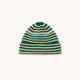 A striped knit beanie hat with alternating dark green and cream horizontal stripes, centered on a solid off-white background.