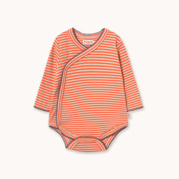 A baby long-sleeve wrap bodysuit with horizontal orange and white stripes, featuring a snap closure at the shoulder and a small brand label at the collar.