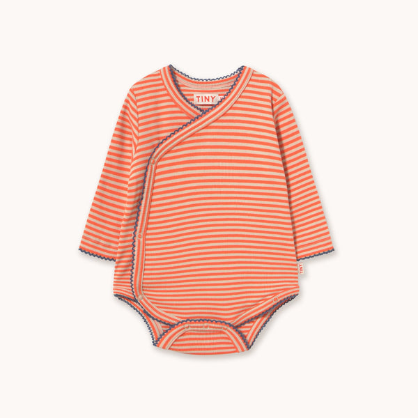 A baby long-sleeve wrap bodysuit with horizontal orange and white stripes, featuring a snap closure at the shoulder and a small brand label at the collar.