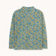 A long-sleeve mock neck shirt with an all-over dense floral print in blue, yellow, and green, displayed flat against a light off-white background.