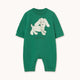 A green short-sleeve baby romper with a white cartoon dog graphic on the chest, displayed flat against a light off-white background.