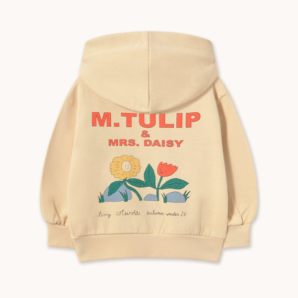 A cream-colored hoodie shown from the back, featuring a colorful graphic print with the text 'M. TULIP & MRS.