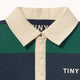 Striped polo shirt with 'TINY' branding on a white background
