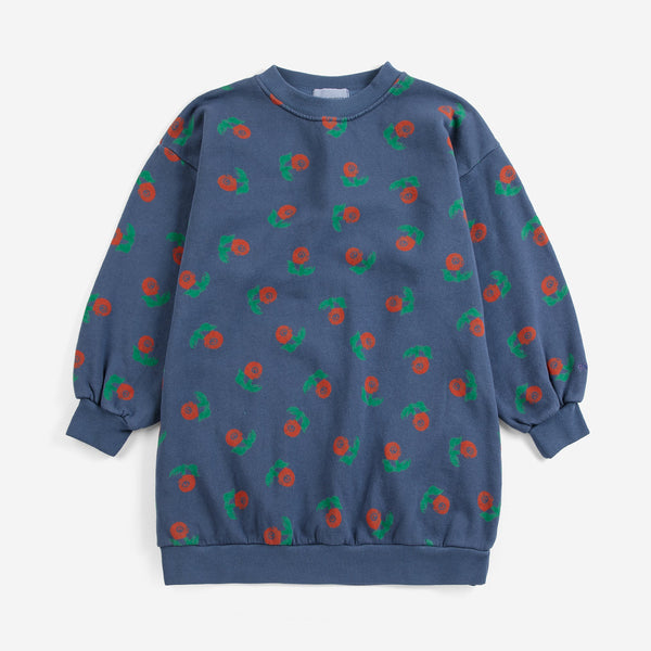 Blue sweatshirt with red and green pattern on a white background