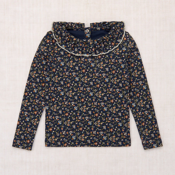 Floral-patterned blouse on a white background