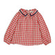 A red and white checkered long-sleeve blouse with a dark navy blue ruffled collar, displayed flat against a plain white background.