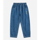 A pair of children's blue denim pants with an elastic waistband, side pockets, and a small yellow embroidered logo on the left thigh, shown against a plain light background.