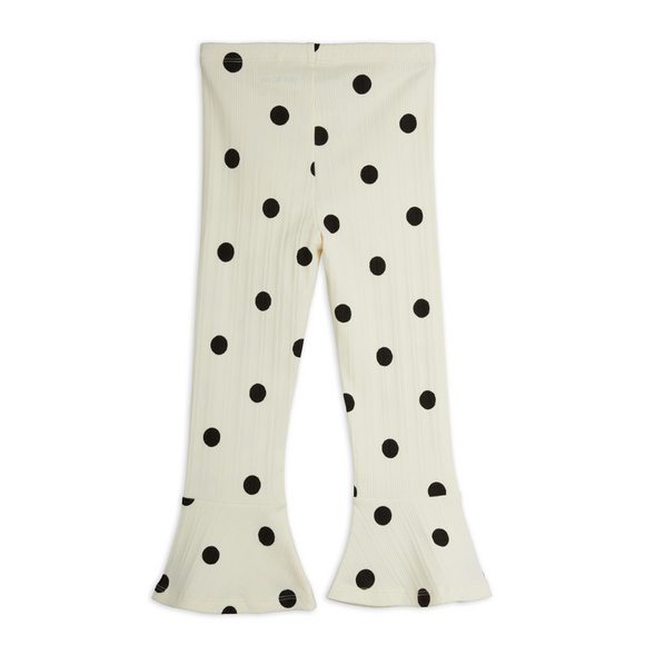 Off-white flared leggings with black polka dots, shown flat against a white background.