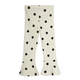 Off-white flared leggings with black polka dots, shown flat against a white background.