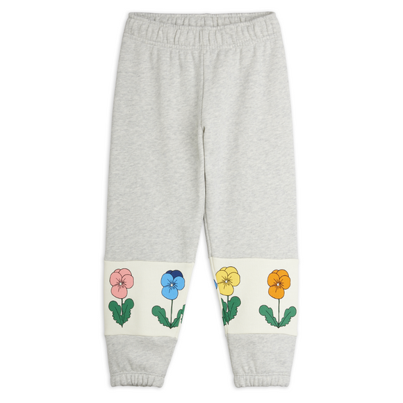 Light gray heather sweatpants with a white band near the hem featuring embroidered pansy flowers in pink, blue, yellow, and orange.