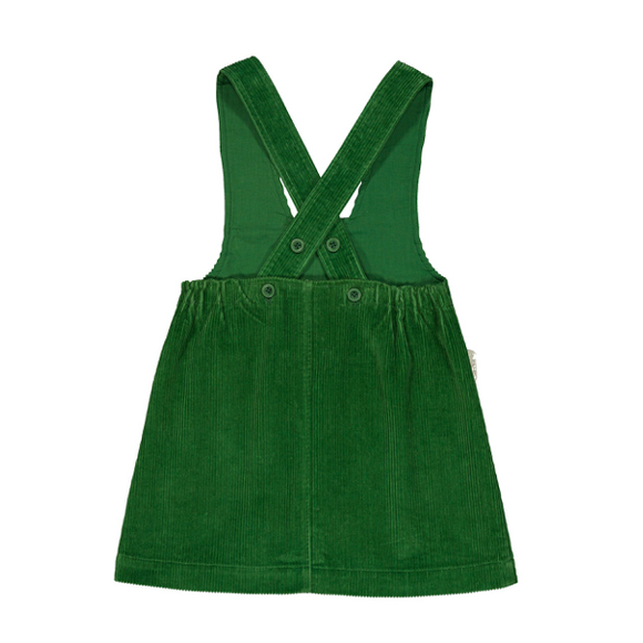 A green corduroy baby overall dress with adjustable shoulder straps and a buttoned bib closure, shown flat on a white background.
