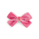 A small pink velvet bow accessory, likely for a dog collar or costume, centered on a plain white background.