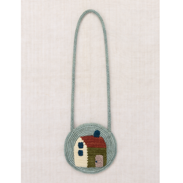 Necklace with a rooster pendant on a white background