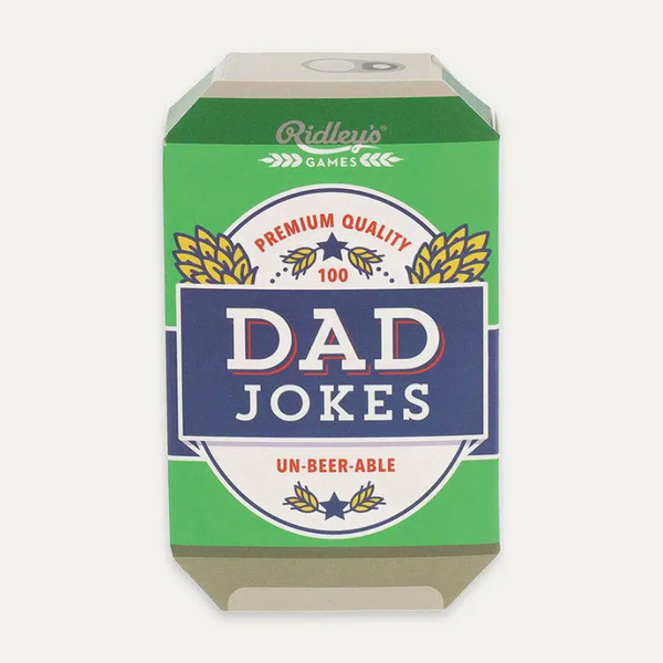A 3D box mockup for a card game called 'Dad Jokes' by Ridley's Games. The box is designed to look like a green beer can with a blue and white central label that reads 'DAD JOKES'.