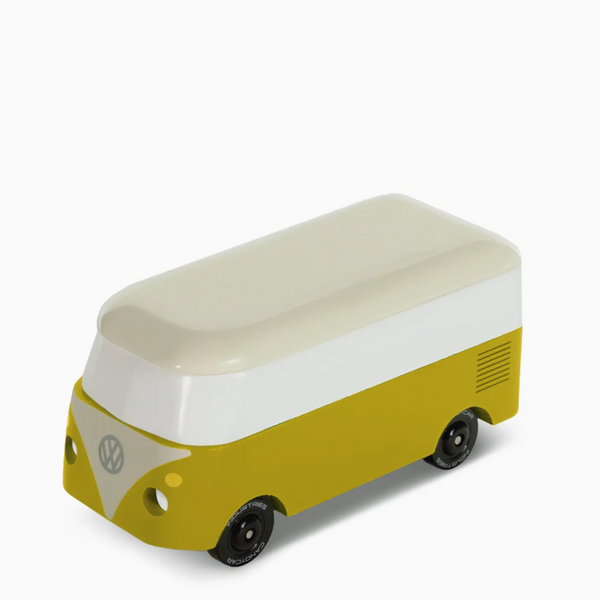 A small toy van shaped like a classic Volkswagen bus, with a yellow-green lower body, an off-white front panel and roof, and black wheels, photographed on a clean white background.
