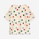 A short-sleeve crewneck top, featuring a cream-colored grid pattern overlaid with colorful polka dots in red, green, blue, black, and beige.