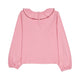 A pink long-sleeve blouse with a ruffled collar and elasticized cuffs, shown flat against a plain white background.